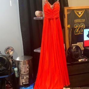 Reddish Orange dress perfect for a dance decent amount of snags from me moving